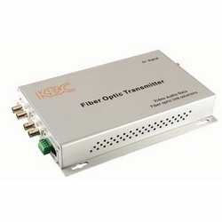 4-ch point-to-point simplex video transmitter, 1-ch duplex data, 1 fiber, 1310/1550 nm multimode, 12 dB optical loss budget. Desktop unit, ST connector, US power plug.